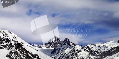 Image of Panoramic view from ski slope on snow mountain in sun winter day