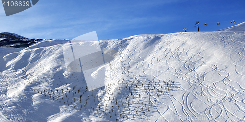 Image of Panoramic view on off-piste slope at sun morning