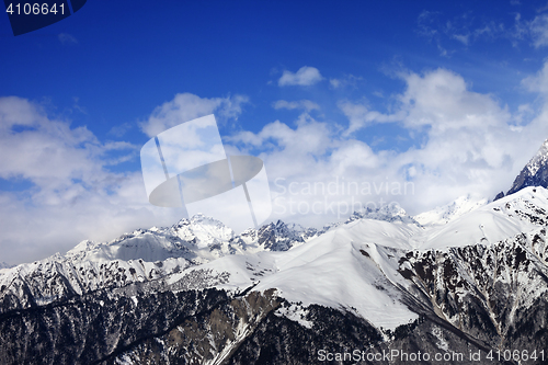 Image of Snow winter mountains in clouds