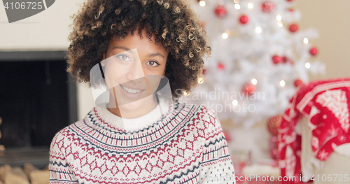 Image of Attractive young woman in Christmas winter fashion