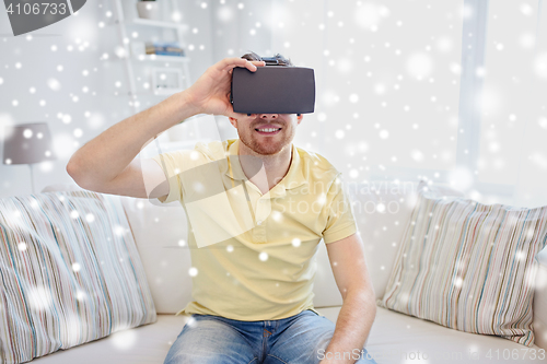 Image of young man in virtual reality headset or 3d glasses