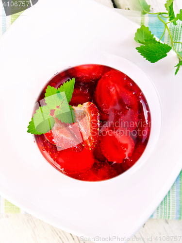 Image of Jelly strawberry with mint on table top