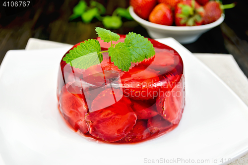 Image of Jelly strawberry with mint and berries on board