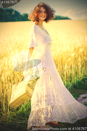 Image of beautiful woman in white summer dress