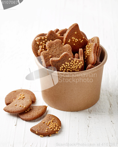 Image of gingerbread cookies in brown paper cup