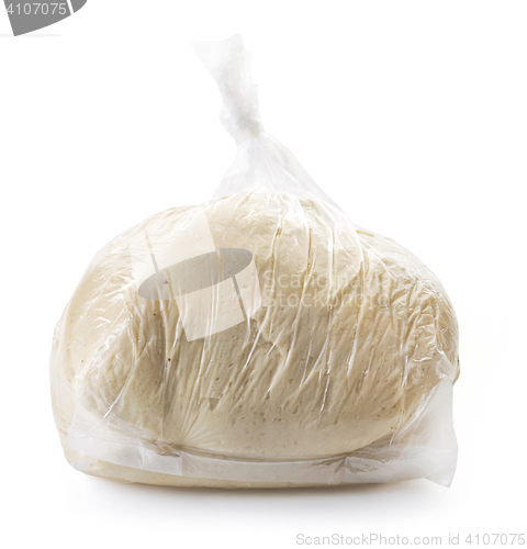 Image of raw dough in plastic packet