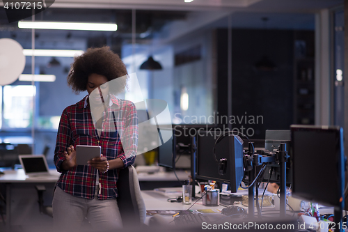 Image of portrait of a young successful African-American woman in modern 