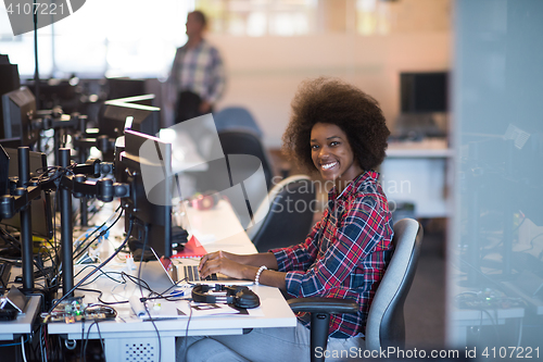 Image of portrait of a young successful African-American woman in modern 