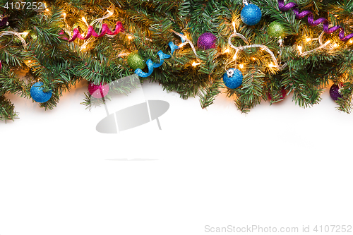 Image of Branch fir with Christmas ornaments