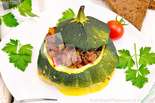 Image of Squash green stuffed in plate on light board