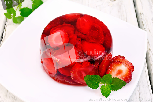 Image of Jelly strawberry with mint on board