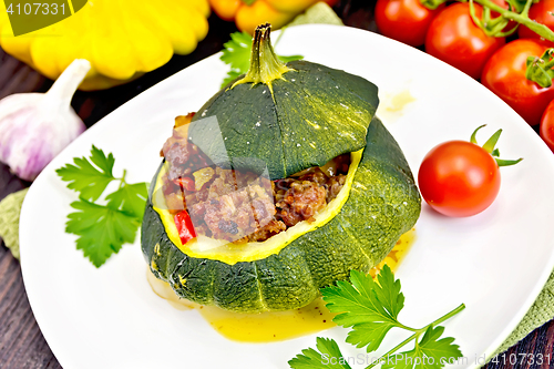 Image of Squash green stuffed on dark board