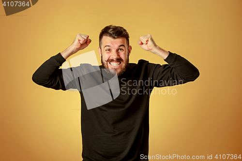 Image of The young man looking at camera