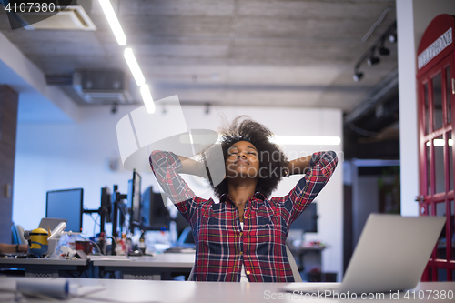 Image of portrait of a young successful African-American woman in modern 