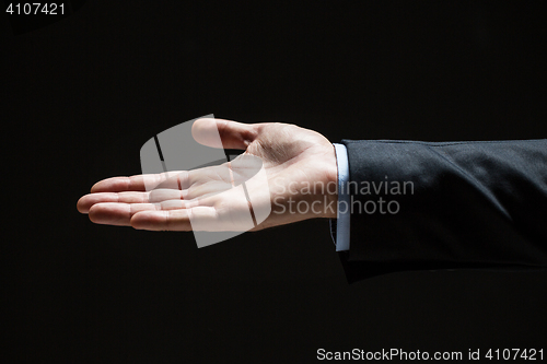 Image of close up of businessman with empty hand