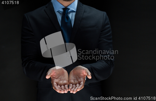 Image of close up of businessman with empty hands