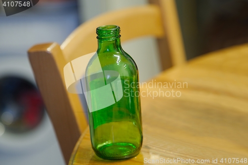 Image of Empty bottle on table