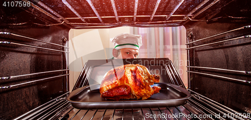 Image of Cooking chicken in the oven.