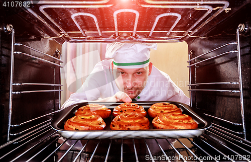 Image of Chef cooking in the oven.