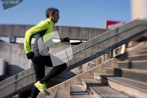 Image of man jogging on steps