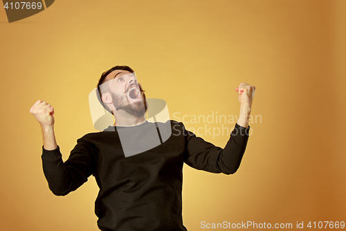 Image of The young man looking at camera