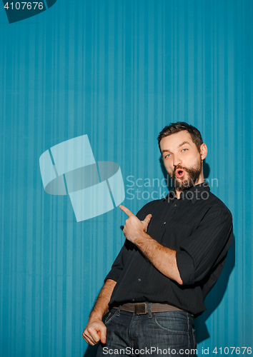 Image of Portrait of young man with happy facial expression