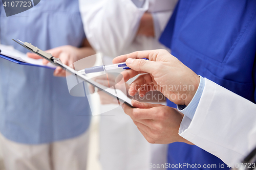 Image of close up of doctors with clipboard at hospital