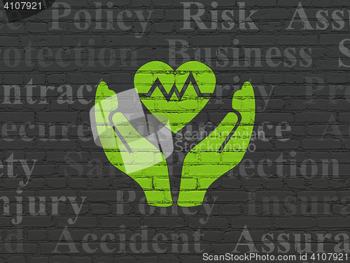 Image of Insurance concept: Heart And Palm on wall background