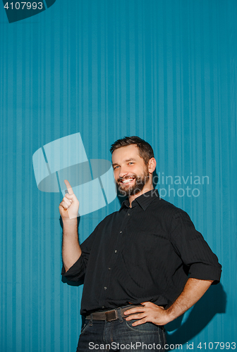 Image of Portrait of young man with happy facial expression