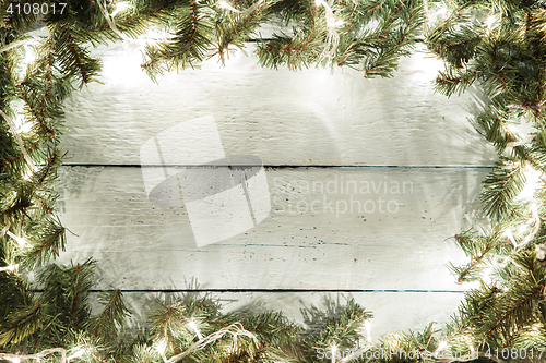 Image of Wooden background with Christmas decoration for your design needs