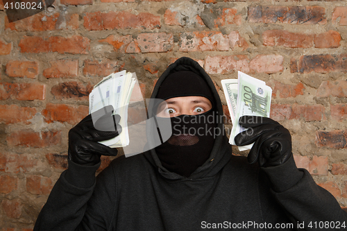 Image of Cracker standing in black gloves