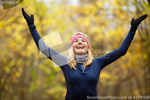 Image of Smiling girl background of landscape