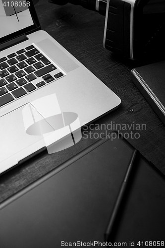 Image of From above view of workplace with laptop