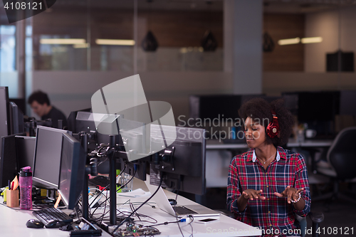 Image of portrait of a young successful African-American woman in modern 