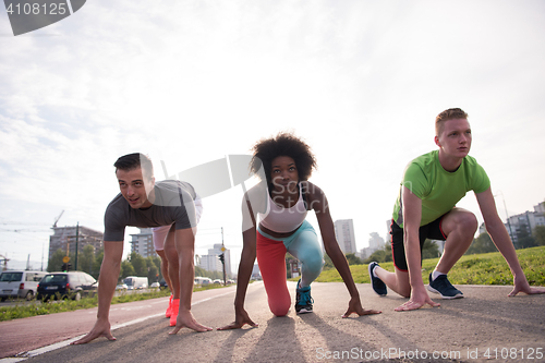 Image of multiethnic group of people on the jogging