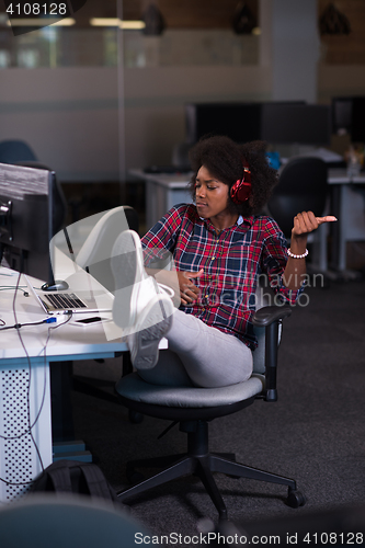 Image of portrait of a young successful African-American woman in modern 