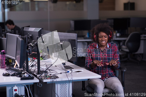 Image of portrait of a young successful African-American woman in modern 