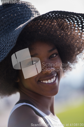 Image of Close up portrait of a beautiful young african american woman sm