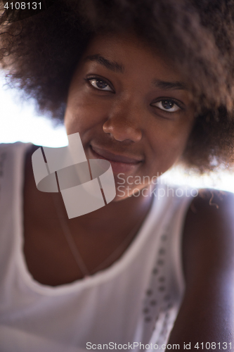 Image of Close up portrait of a beautiful young african american woman sm