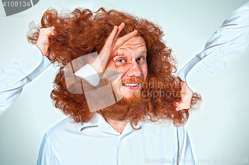 Image of The Angry man tearing his hair