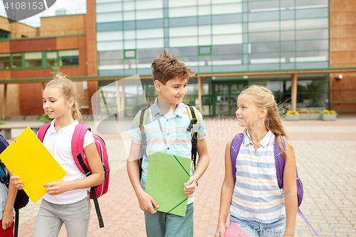 Image of group of happy elementary school students walking