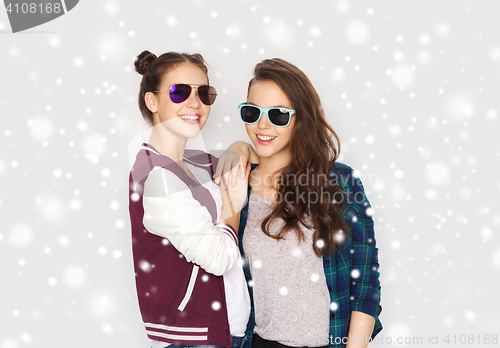 Image of happy smiling pretty teenage girls in sunglasses