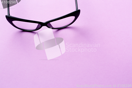 Image of Black glasses with transparent lenses