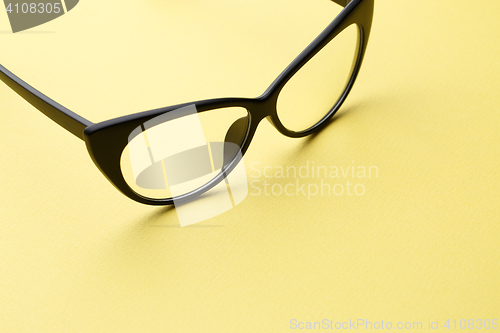 Image of Black eyeglasses with transparent lenses