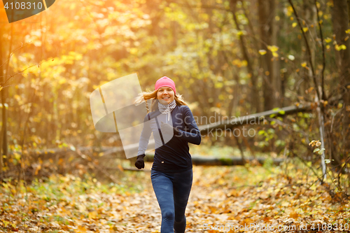 Image of Blonde woman running in morning