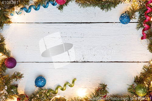 Image of Template Christmas frame with wooden surface and decorations