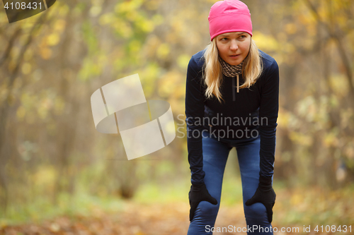 Image of Blonde playing sports in park