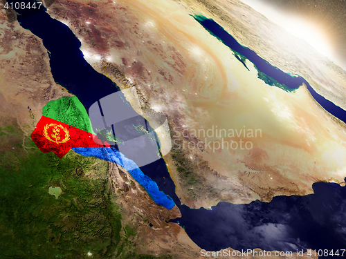 Image of Eritrea with flag in rising sun