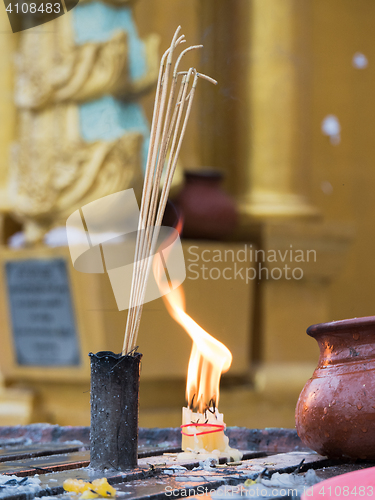 Image of Joss sticks and candles at the Shwedagon Pagoda