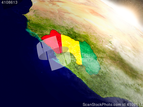 Image of Guinea with flag in rising sun